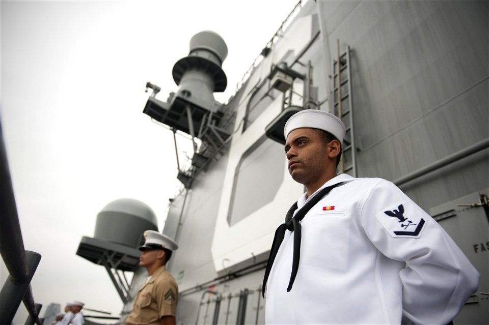 Manning the rails as USS America departs Rio De Janeiro 140809-N-FR671-043