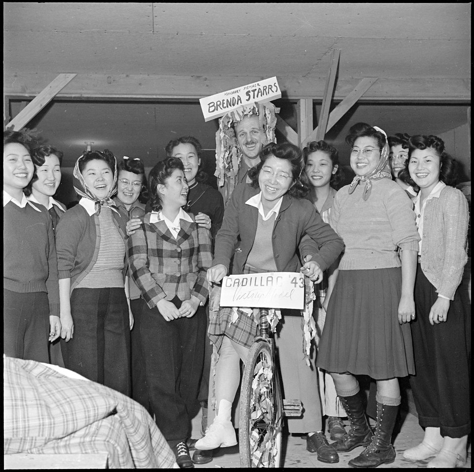 Heart Mountain Relocation Center, Heart Mountain, Wyoming. After a mock ceremony of presenting a vi . . . - NARA - 539157