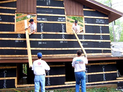US Navy 061019-N-5531C-002 Sailors assigned to the Virginia-class fast-attack submarine North Carolina (SSN 777) participate in a Habitat for Humanity project as a part of Navy Week photo