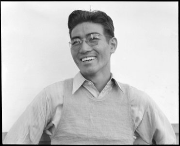 Manzanar Relocation Center, Manzanar, California. Henry Ishizuka, graduate of University of Califor . . . - NARA - 537997 photo