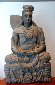 Maitreya, seated Bodhisattva, Gandhara, c. 3rd century AD, gray schist - Matsuoka Museum of Art - Tokyo, Japan - DSC07085 photo