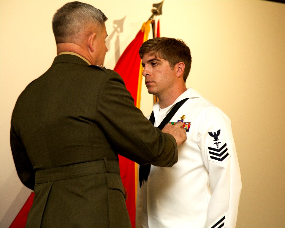 Major Gen. Joseph L. Osterman awards Hospital Corpsman 1st Class Kevin D. Baskin the Silver Star Medal. (16258539813)