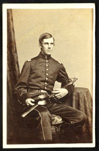 Major Oliver Wendell Holmes, Jr., of Co. A and Co. G, 20th Massachusetts Infantry Regiment in uniform with sword) - Silsbee, Case & Co., photograph artists, 299-1-2 Washington St., Boston LCCN2016650153 photo