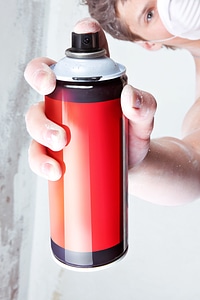 Spray can in hand photo