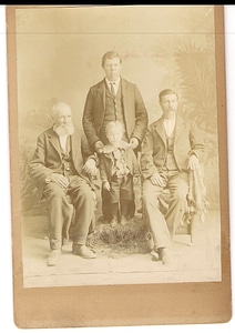 Vintage photo men and boy photo