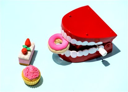Red And White Mouth Plastic Toy And Food Plastic Toys photo
