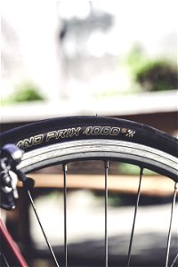 Close-up Photo Of Black Bike Wheel photo