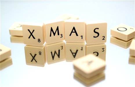 Closeup Photography Of Xmas Scrabble Pieces photo