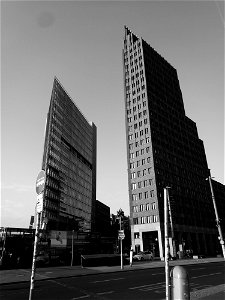 Gray Scale Photo Of High Rise Building photo
