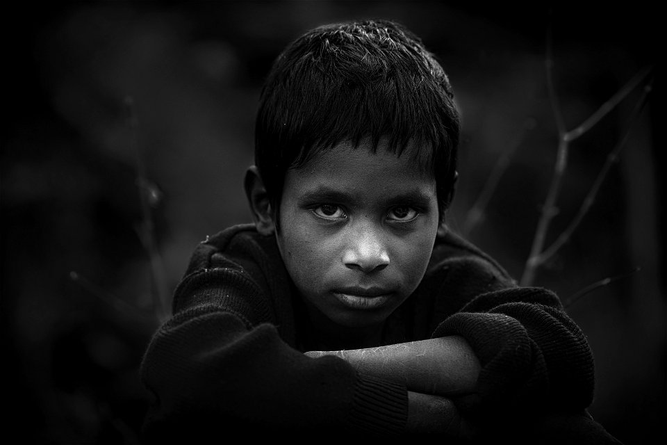Grayscale Photo Of Boy In Long-sleeved Shirt
