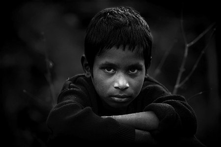Grayscale Photo Of Boy In Long-sleeved Shirt photo