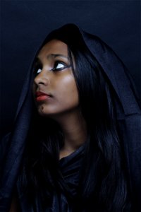 Closeup Photography Of Woman Wearing Black Robe