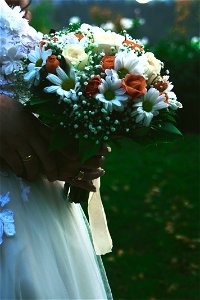 Bride Holding Bridal Bouquet photo