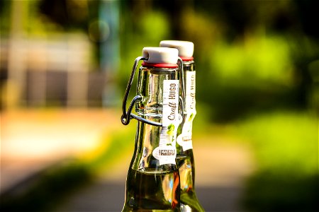 Selective Focus Photography Of Two Clear Air Tight Bottles photo