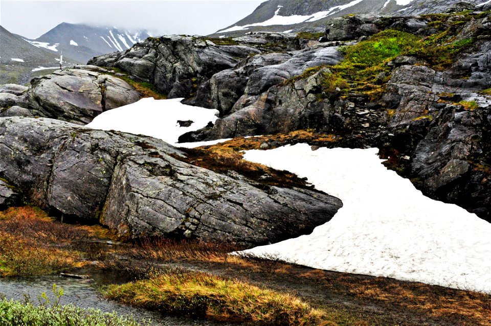 Gray Stone Surrounded By Snow