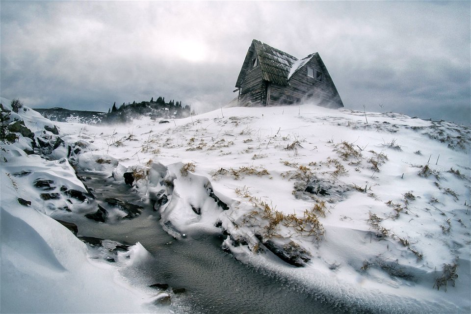 Gray House Surrounded By Snow