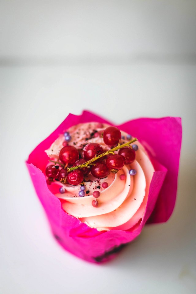 Cupcake With Red Berries On Top
