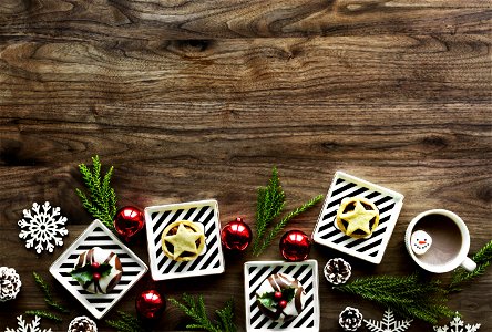 Square White Christmas Theme On Brown Wooden Floor photo
