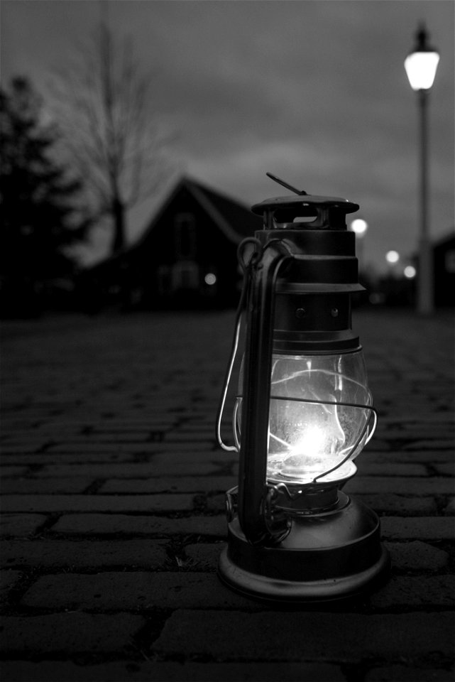 Greyscale Photography Of Lamp On Floor photo