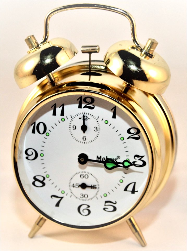 Brass-colored Alarm Clock At 315 photo