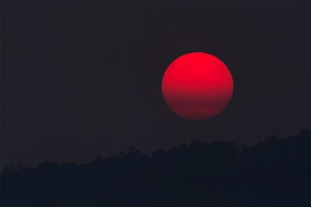 Red Moon During Night Time photo