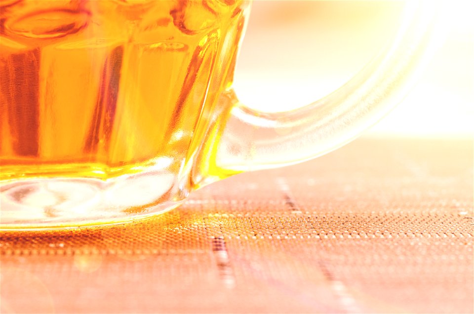 Closeup Photography Of Clear Glass Beer Mug Filled With Yellow Liquid photo