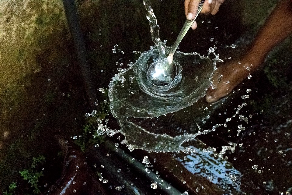Person Holding Stainless Steel Spoon