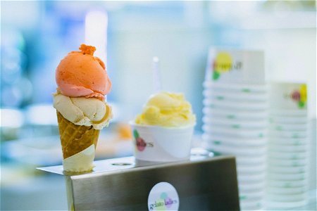 Ice Cream On Cone With Gray Metallic Holder Photo photo