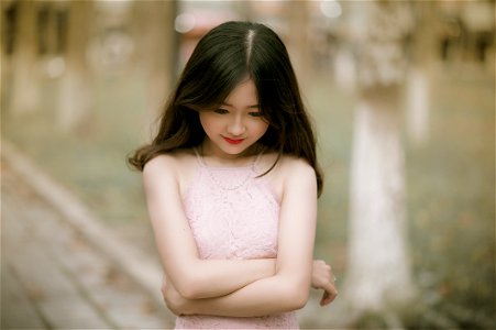 Shallow Focus Photography Of Woman In Pink Dress photo