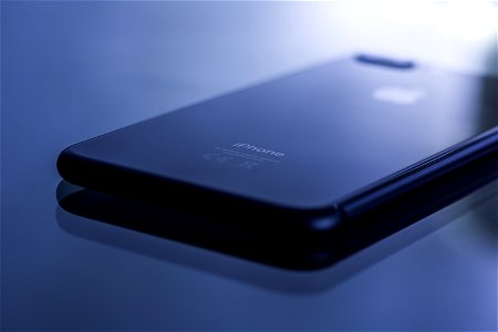 Black Iphone 7 Plus On White Surface photo
