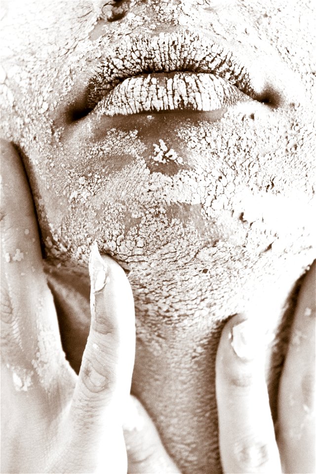Persons Face Covered With White Powder photo