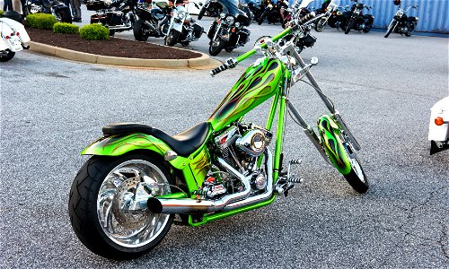 Green Naked Chopper Motorcycle On Parking Lot