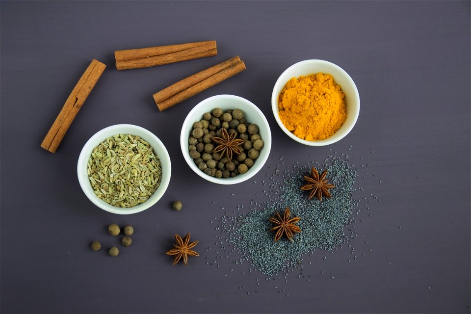 Assorted Spices Near White Ceramic Bowls photo