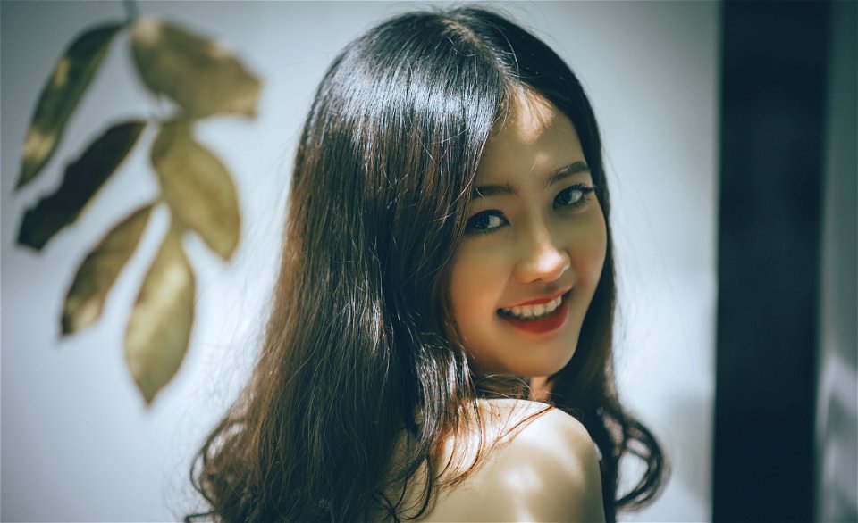 Woman With Black Long Hair Smiling