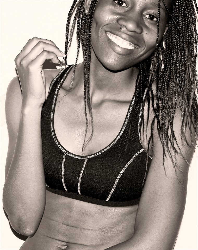 Woman In Sport Bra With Braided Hair Grayscale Photo photo
