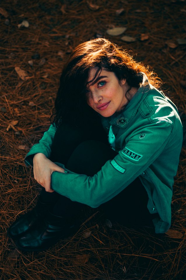 Woman Sitting On The Ground photo