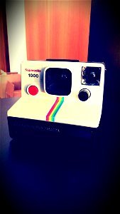 White And Black Polaroid Camera