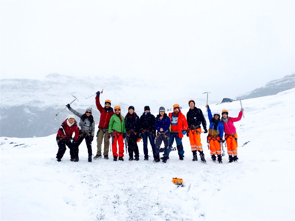 Men And Women At The Mountain Covered With Snow photo