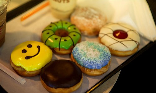 Shallow Focus Photography Of Assorted Flavored Donuts photo