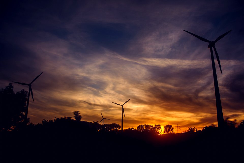 Black Windmills During Sunset photo