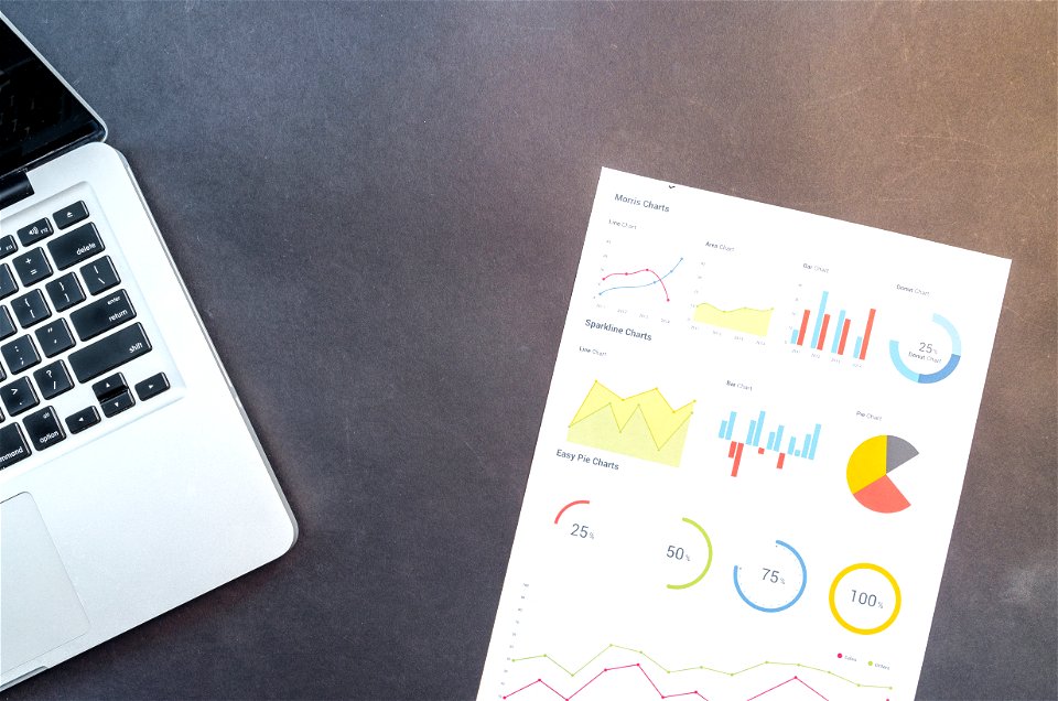 Paper Beside Macbook