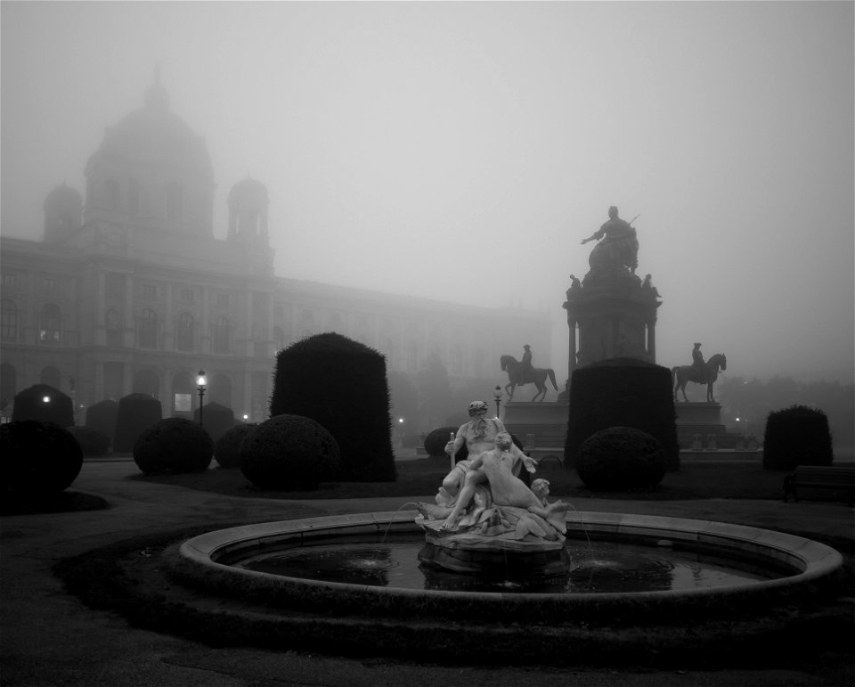 Two People Statue Over Fog