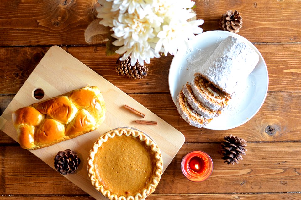 Brown Pastry And Cupcake In Chopping Board