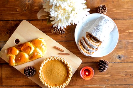Brown Pastry And Cupcake In Chopping Board photo