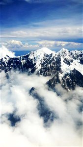 Aerial View Of Mountain With Snow