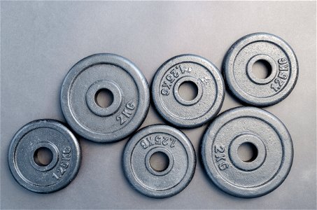 Six Assorted Weight Plates photo