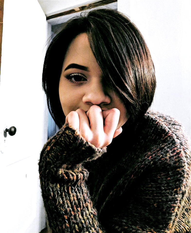 Woman In Gray Sweater