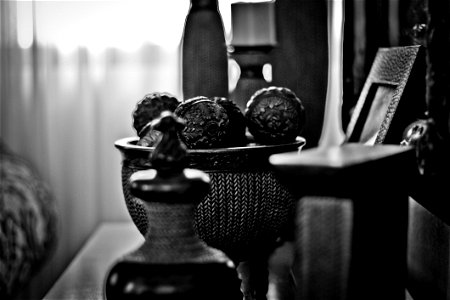 Grayscale Photography Of Home Decorations Near Window photo