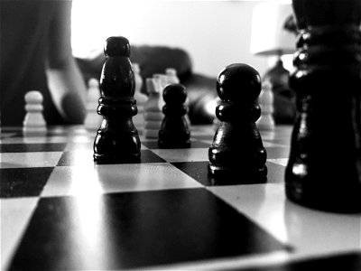 Grayscale Photography Of Chess Board photo