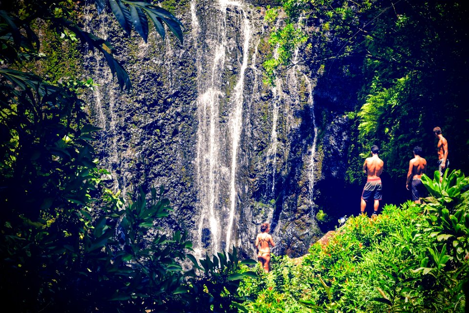 Group Of People At A Waterfall photo